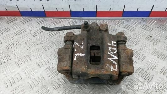 Суппорт тормозной задний левый mitsubishi pajero 4