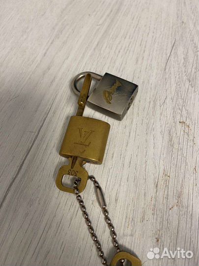 Замки louis vuitton и brioni