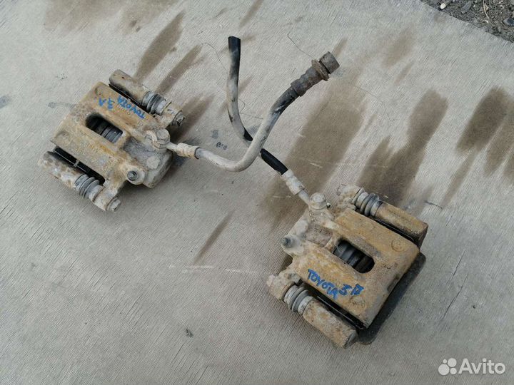 Суппорт задний Toyota Corolla E120