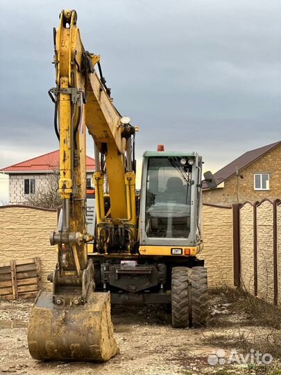 Колёсный экскаватор New Holland MH Plus, 2005