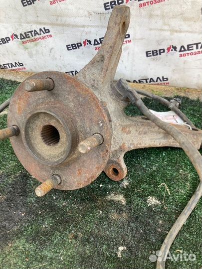 Кулак поворотный передний правый Mitsubishi Lancer