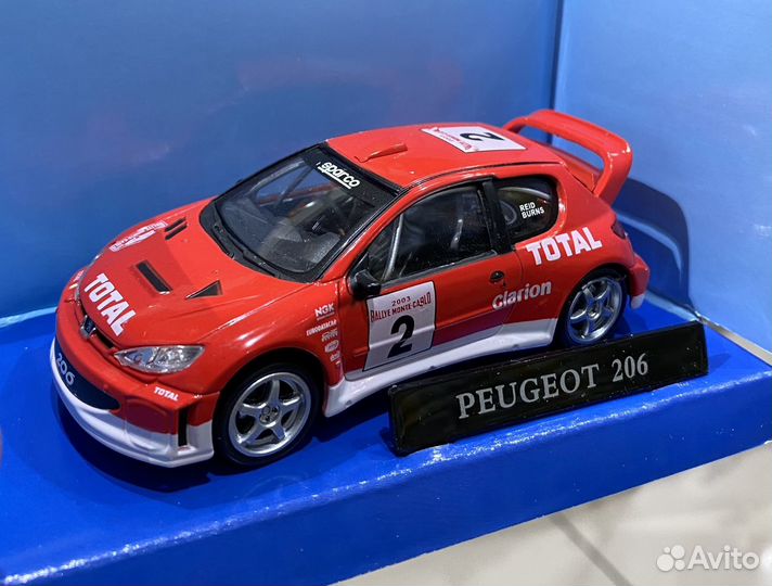 Модель автомобиля Peugeot 206 WRC Cararama 1/43