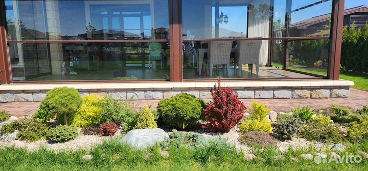 Гильотинное остекление коттеджей