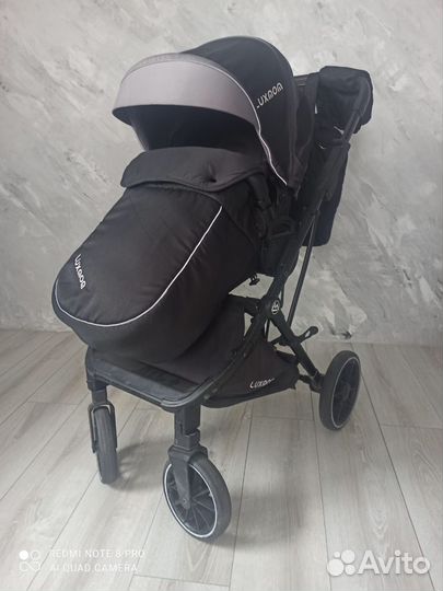 Прогулочная коляска luxmom 740