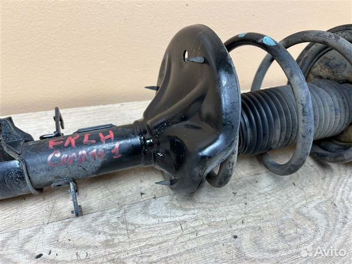 Амортизатор передний левый Kia Cerato 1 1.6 АКПП