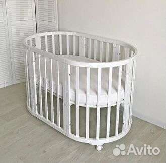 Детская кроватка с маятником круглая