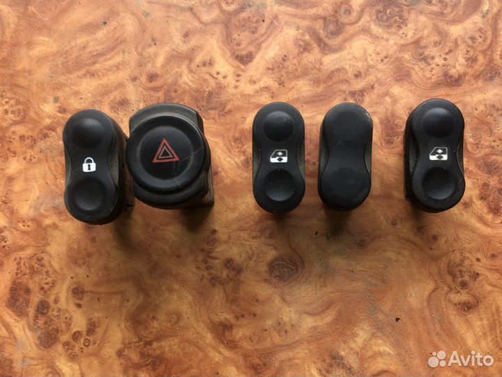 Кнопки салона передней панели Renault Logan