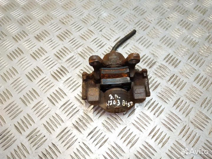 Суппорт тормозной задний левый Mercedes-Benz