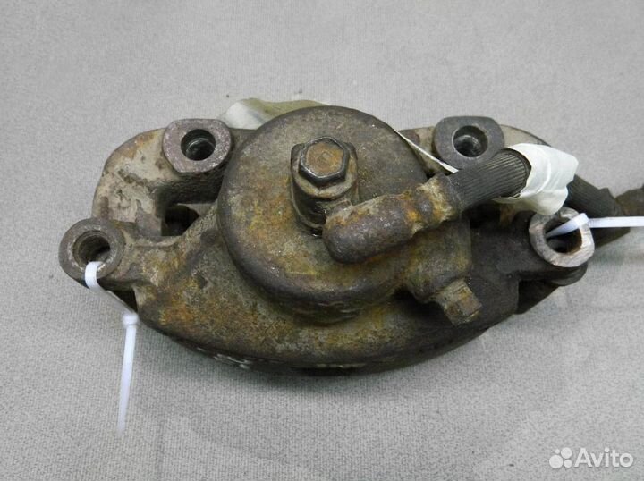 Суппорт передний левый Nissan Primera P10