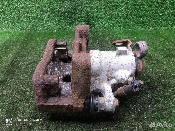 Суппорт задний левый Opel Astra H (2004-2014)