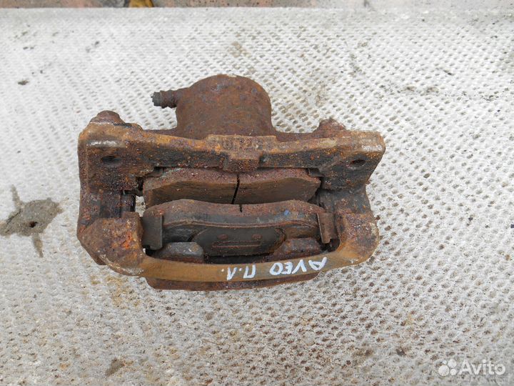 Передний левый суппорт Chevrolet Aveo T250