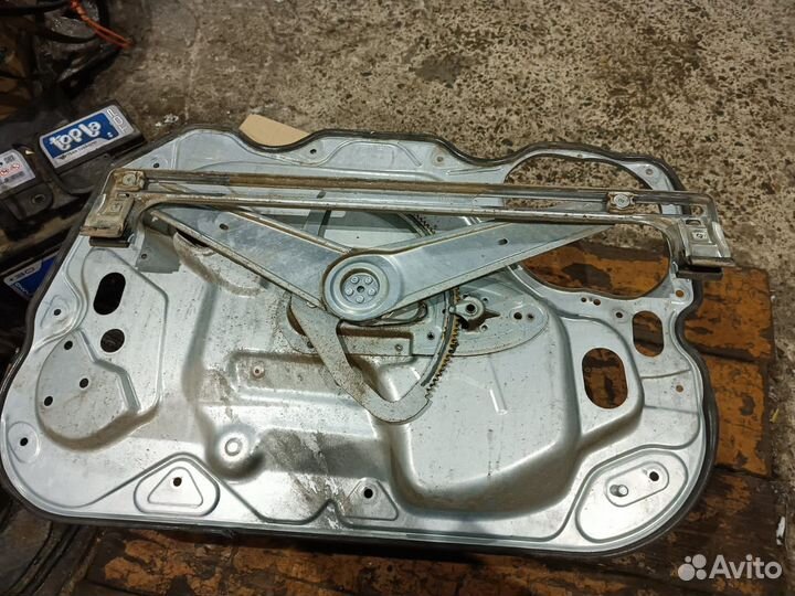 Стеклоподьемник передний левый Форд Фокус2
