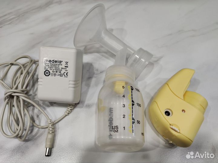 Молокоотсос medela электрический