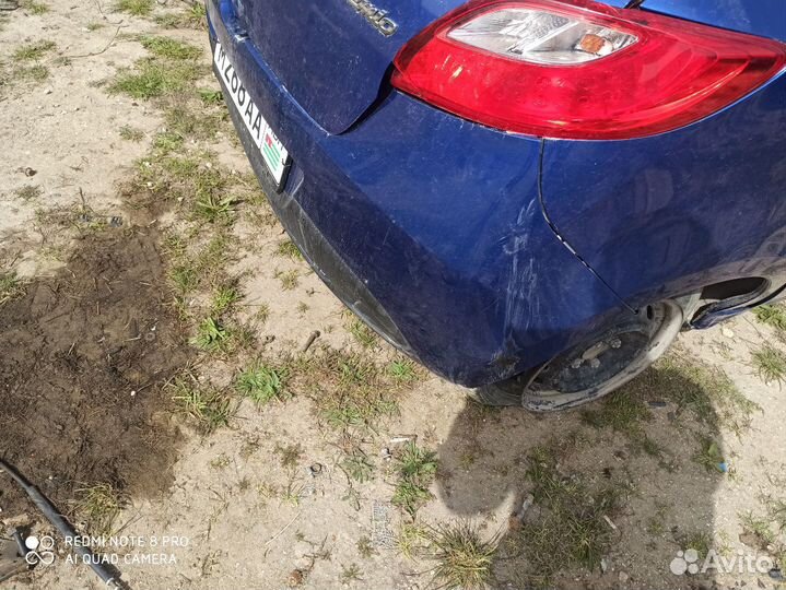 Задний бампер Mazda Demio DE3FS