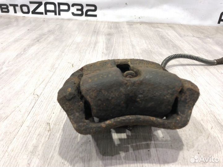 Суппорт тормозной передний левый Renault Symbol