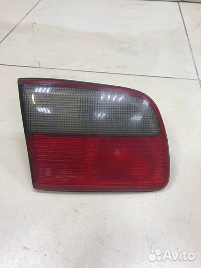 Фонарь крышки багажника левый Opel Omega