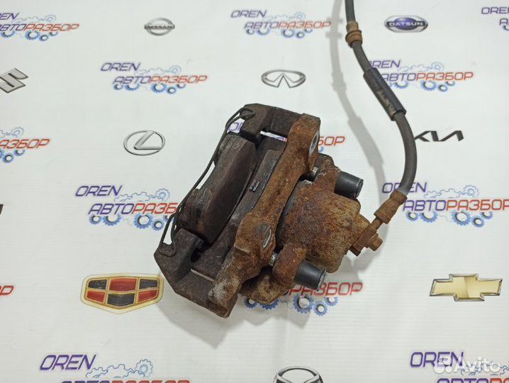 Суппорт тормозной передний левый Volkswagen Polo 5