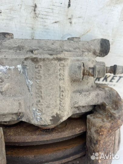 Суппорт тормозной передний левый Chevrolet Niva