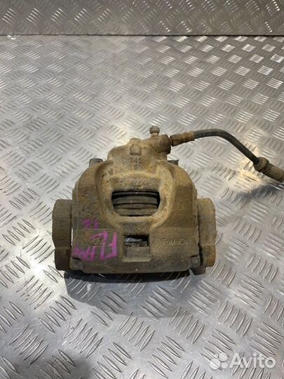 Суппорт тормозной передний левый Ford Mondeo 4 1.6