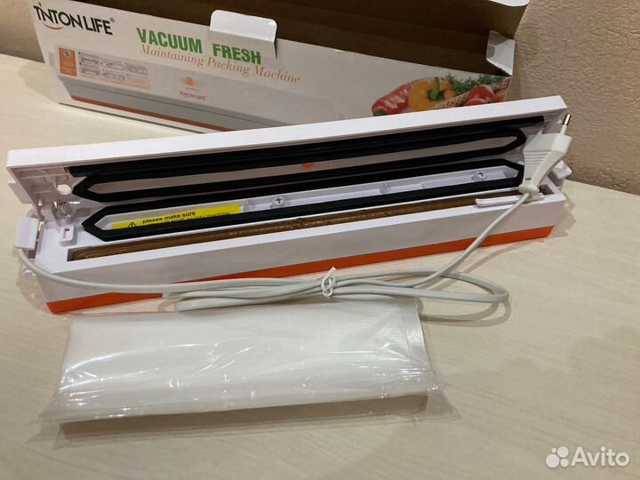 Вакуумный упаковщик