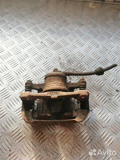 Суппорт тормозной передний правый Chevrolet Aveo