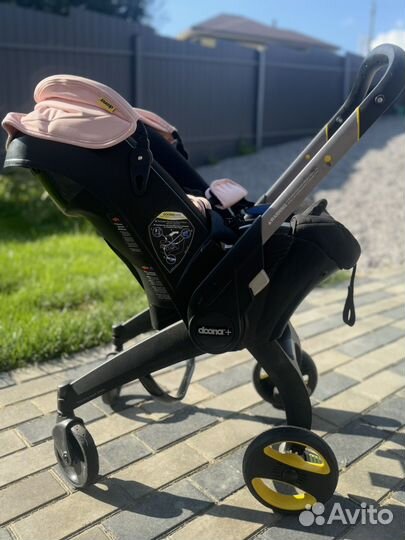 Doona кресло коляска с isofix базой