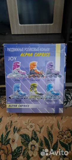 Роликовые коньки новые