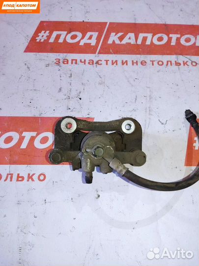 Суппорт тормозной задний левый Hyundai ix35 2012