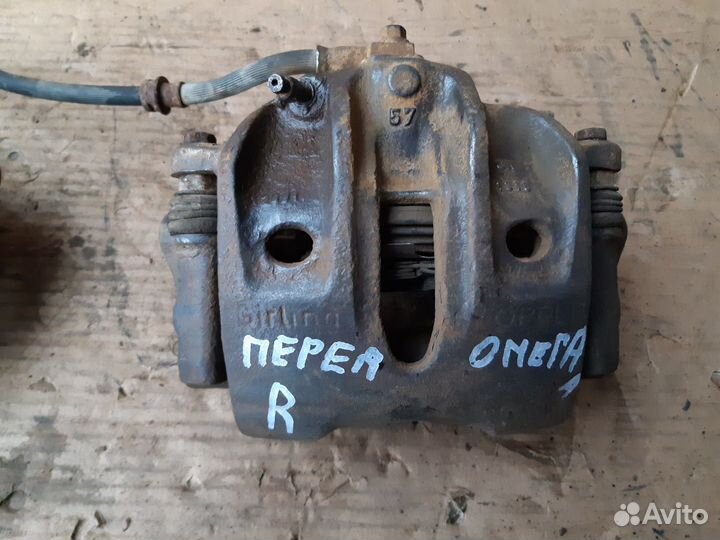 Суппорт передний Опель Омега А