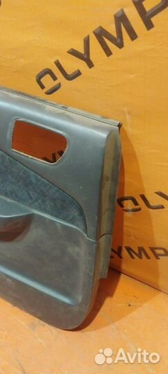 Обшивка двери задняя левая Toyota Carina AT212