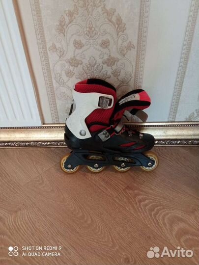 Роликовые коньки