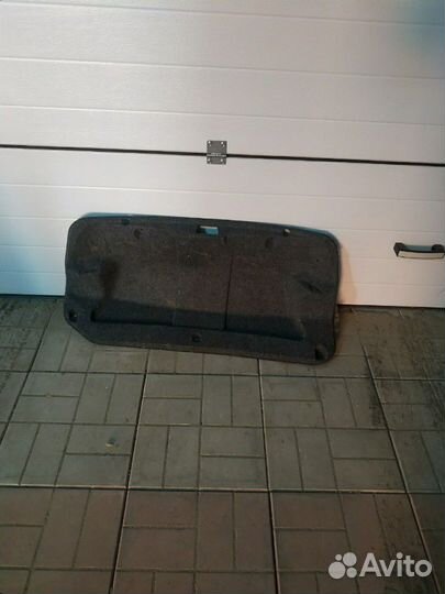 Обшивка багажника Lancer X