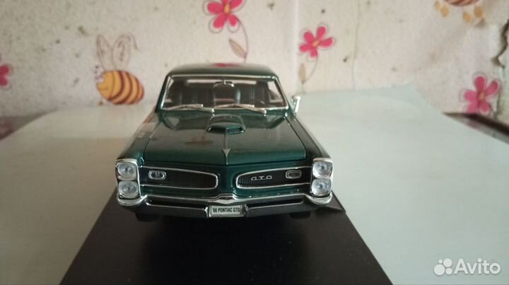 Модель автомобиля Pontiac GTO 1966 Welly 1/18