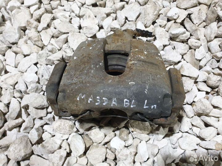 Суппорт передний Mazda 3 BL