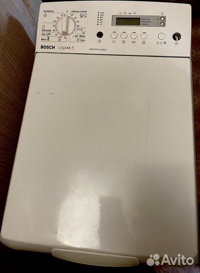 Стиральная машина с вертикальной загрузкой