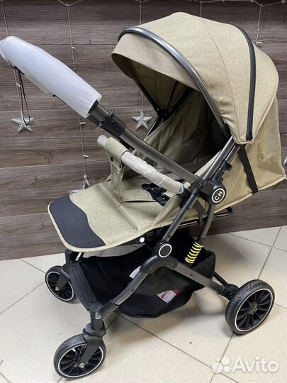 Коляска Luxmom 525 с перекидной ручкой 2 цвета