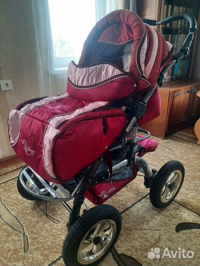 Всесезонная коляска-трансформер с люлькой