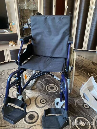 Инвалидная коляска
