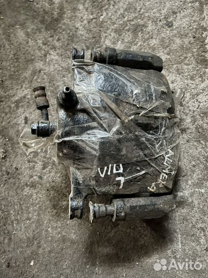 Суппорт передний левый Nissan Almera Classic b10