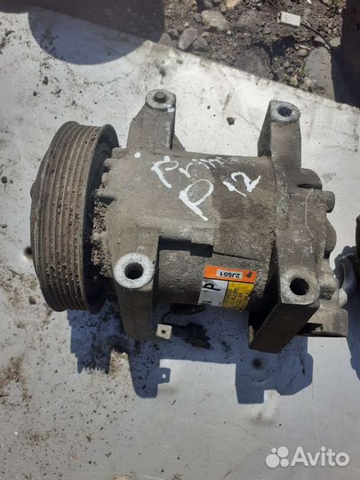 Компрессор кондиционера Nissan Primera P12
