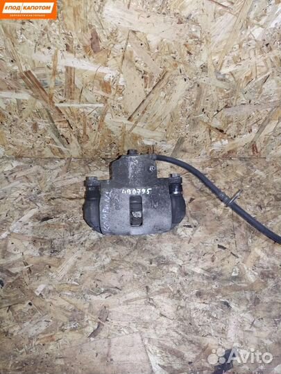 Суппорт тормозной задний правый Toyota Camry XV40