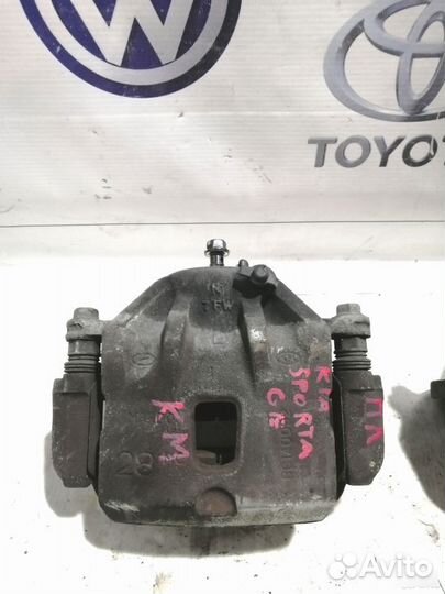 Суппорт тормозной передний Kia Sportage 2 KM