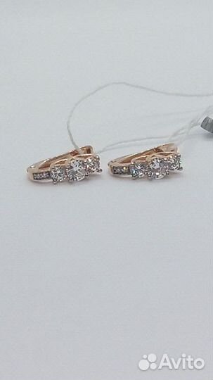 Золотые серьги с камнем