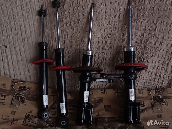 Стойки амортизаторные