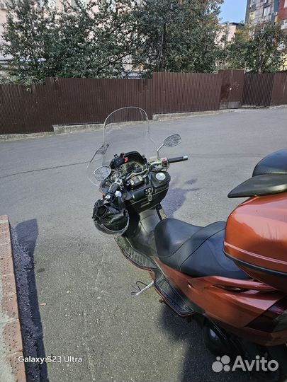 Макси скутер