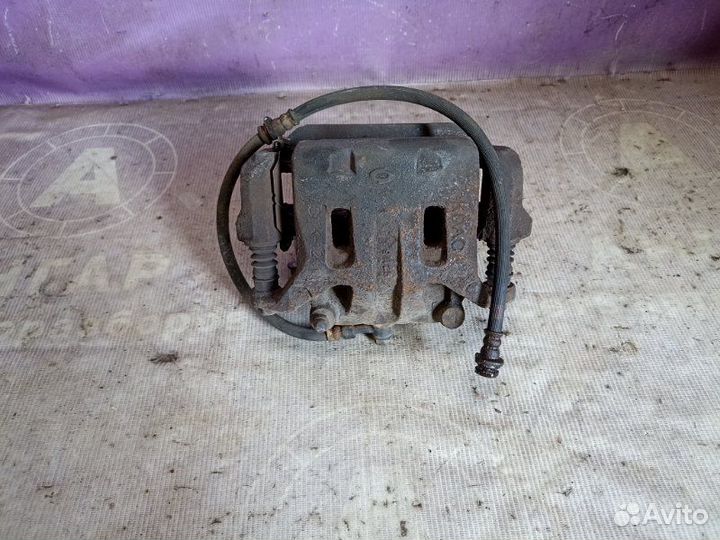 Суппорт тормозной передний левый Renault Koleos