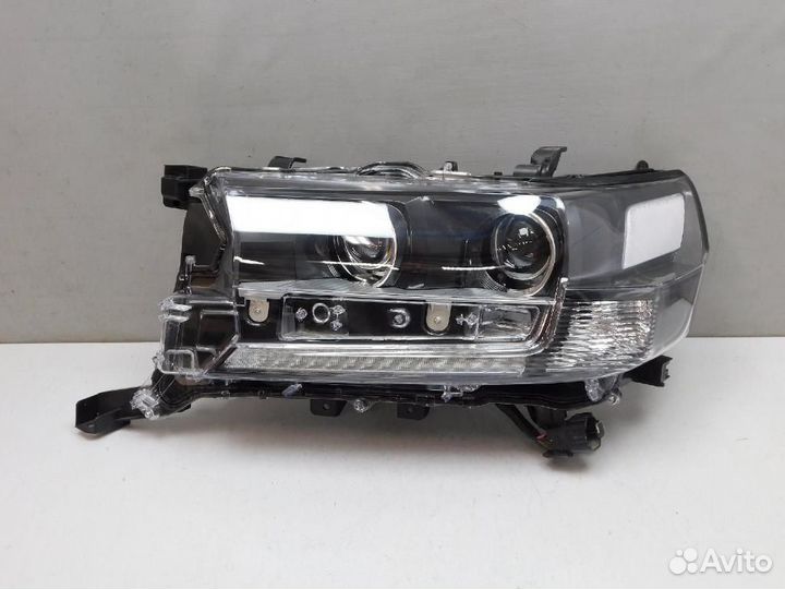 Фара левая Toyota Land Cruiser