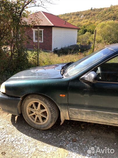 Kia Clarus 2.0 МТ, 2000, битый, 302 852 км