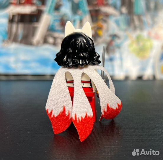 Фигурка lego akita из набора 70678