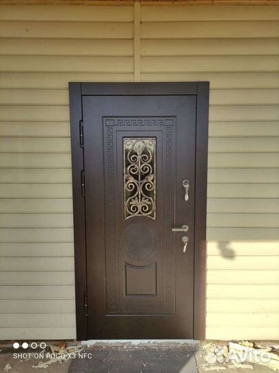 Дверь стальная с ковкой